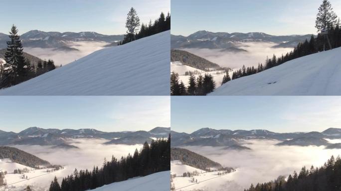 空中: 田园诗般的朱利安阿尔卑斯山雪山的壮观无人机景观