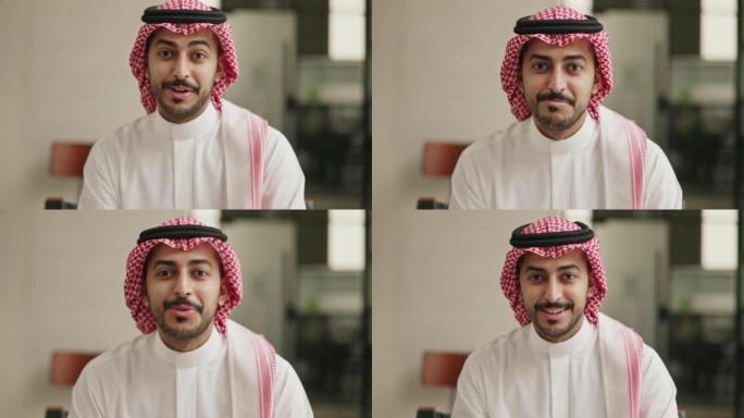 20年代末充满活力的沙特商人与相机交谈