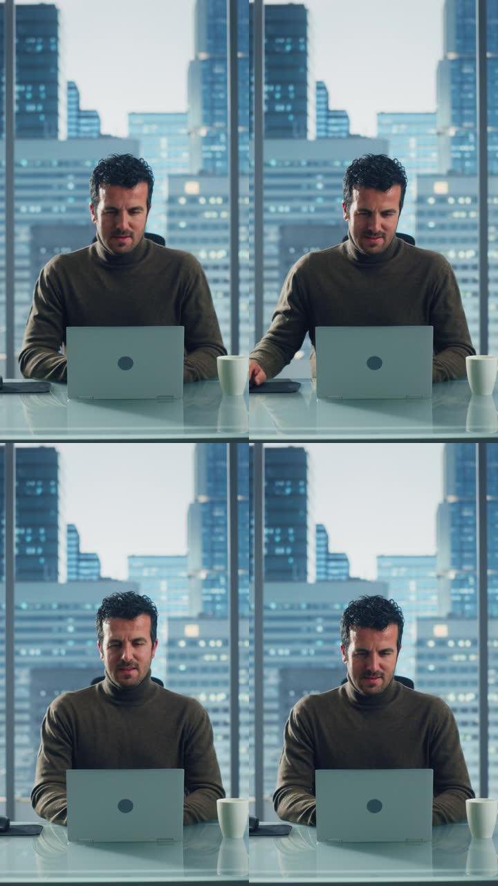 垂直屏幕。在他的大城市办公室里，轻松出色的商人在笔记本电脑上工作的肖像。魅力四射的数字企业家为电子商