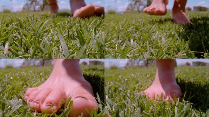 特写，DOF: 在美丽的夏日，赤脚女人在花园草皮上行走