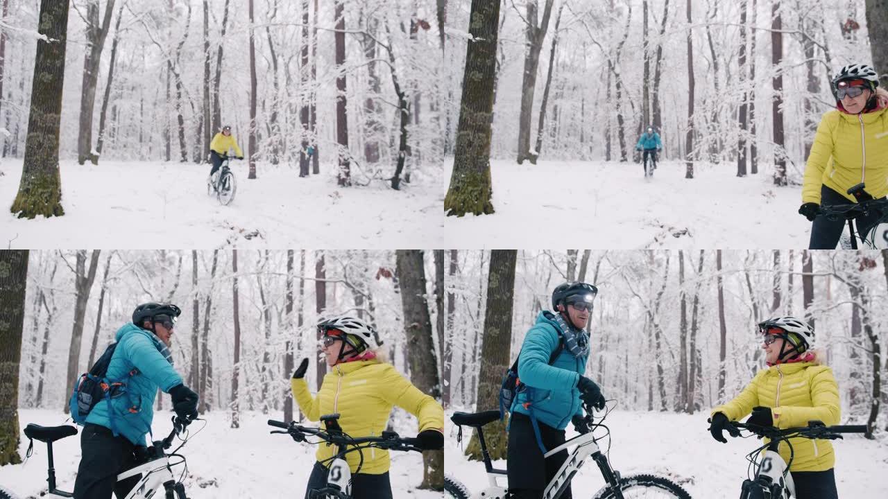 Slo mo夫妇在白雪覆盖的森林中给自己高五分