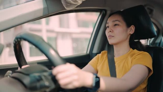 亚洲女子驾驶汽车女司机驾车