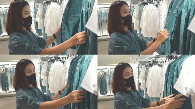 新常态: 亚洲女人戴着口罩购物
