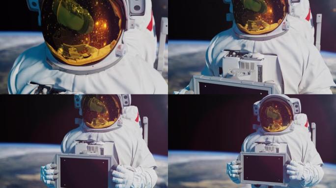 穿着太空服的太空人持有带色度键的数字标签