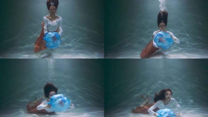 粗心的废物处理。年轻的混血女子跳水，漂浮在水下扔掉蓝色垃圾袋慢动作。