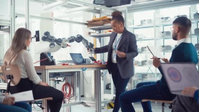 公司会议室: 自信的黑人女工程师与聪明的未来开发人员讨论机器人技术的创纪录突破。计算机科学概念。移动