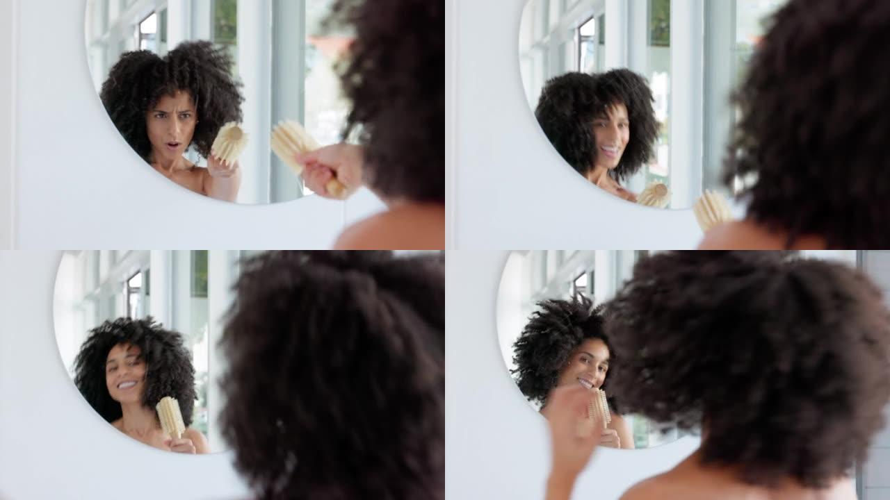 黑人妇女，在浴室家里的镜子上跳舞和唱歌，玩得开心，为一天做准备。来自南非的快乐女性的头发护理、舞蹈或
