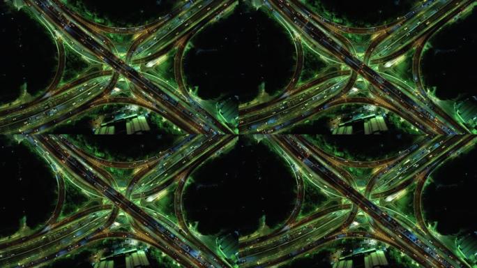 夜间立交桥和城市交通的无人机视点