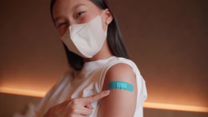年轻的亚洲女性或青少年接受新型冠状病毒肺炎抗病毒疫苗