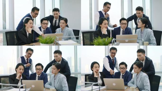 亚洲商务人士小组在办公室开会