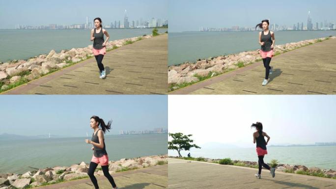 年轻的亚洲女子在海边奔跑