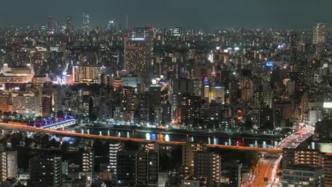 东京城市景观的时间流逝与各种建筑摩天大楼在夜间，日本