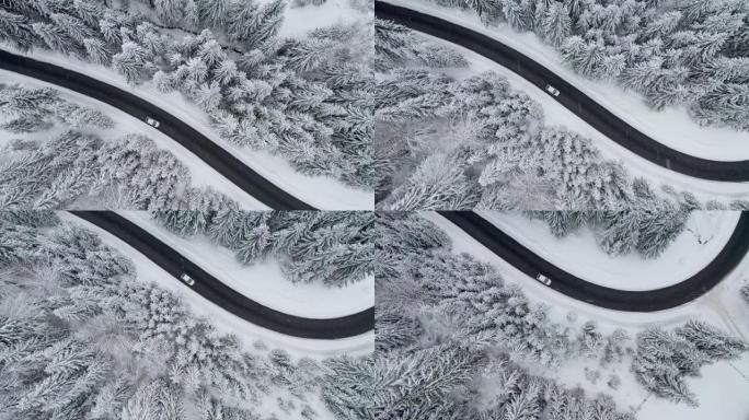 空中自上而下拍摄的白色汽车在冬季白雪皑皑的森林中沿着道路行驶。冬天开车旅行，恶劣天气开车