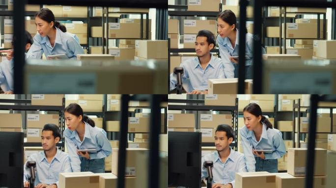 快乐的亚洲男人和女士伴侣穿正式衬衫坐在办公桌前电脑和条码机扫描仪讨论库存细节客户在线数据交付在仓库。