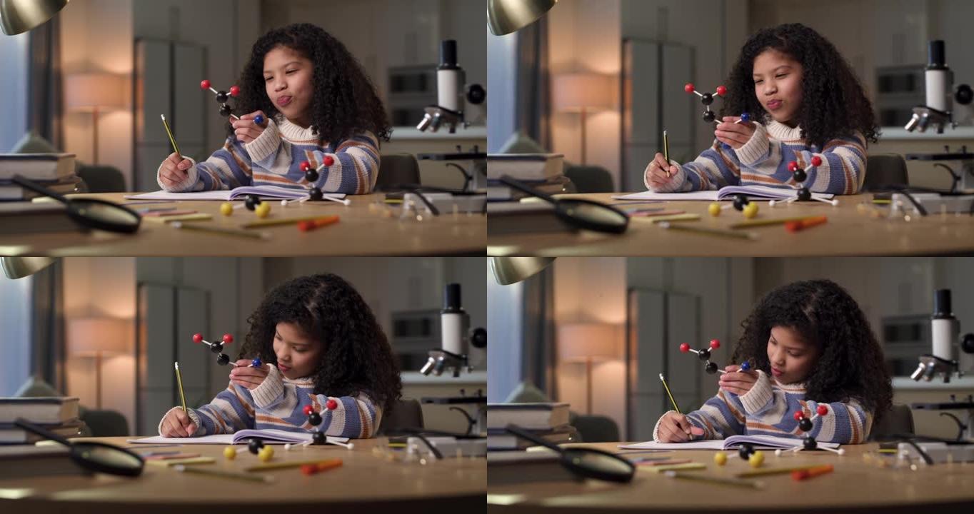 4k视频片段，一个年轻女孩独自坐在家里，在做科学作业时看起来很沉思