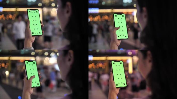 城市电话上的绿屏智能手机打字通话购物自拍