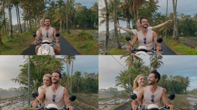 快乐的夫妇骑踏板车在热带岛屿上快乐的女人举起手臂庆祝享受与男朋友骑摩托车在晨雾中的浪漫冒险