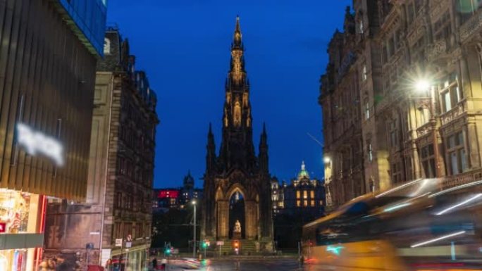 拥挤的交通和通勤旅游人员在爱丁堡斯科特纪念碑观光的时间流逝