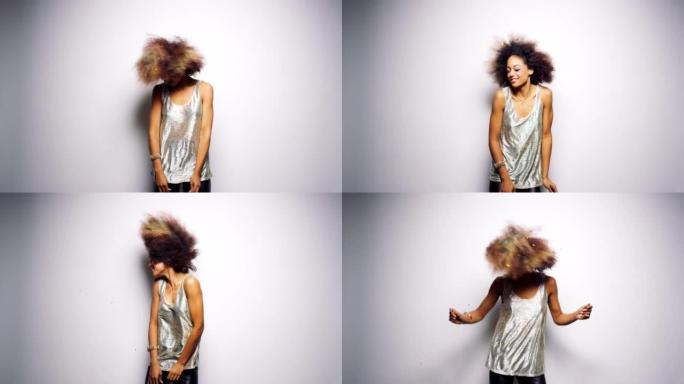 4k视频片段，一名年轻女子在工作室背景下跳舞