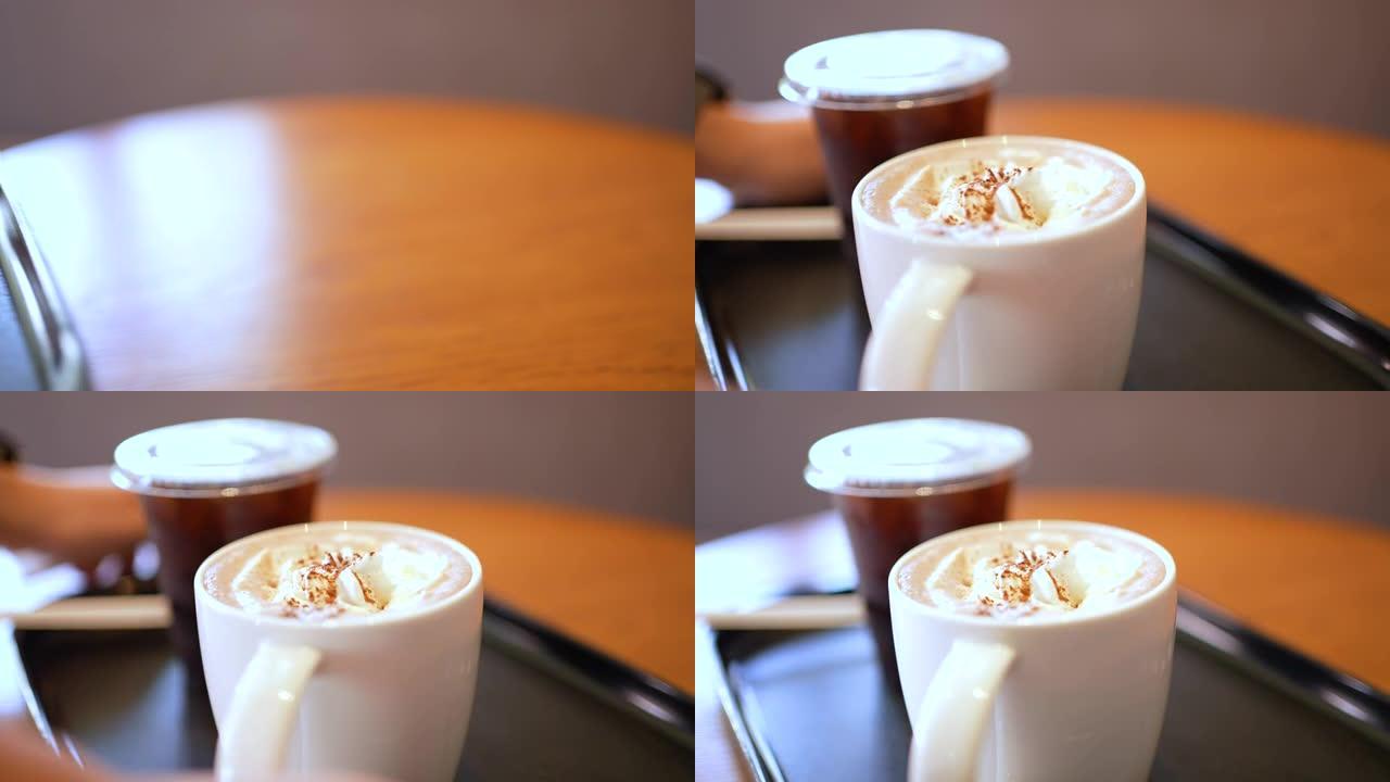 咖啡放在木桌上端来咖啡