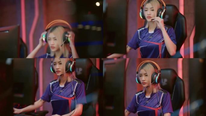 亚洲女性电子竞技职业玩家专注于比赛。