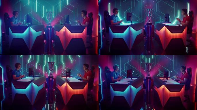 两名专业的电玩游戏玩家使用控制器在具有大电视屏幕和时尚霓虹灯竞技场的锦标赛上玩控制台视频游戏。全球在