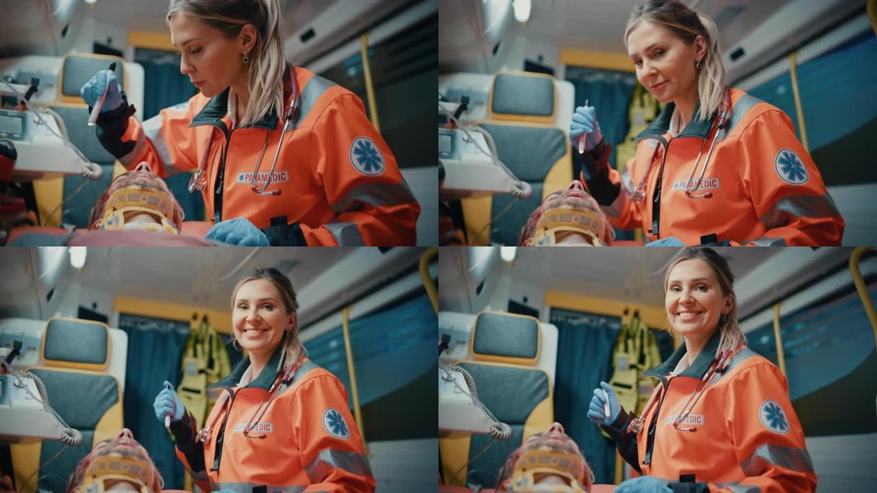 女性专业急救护理人员在救护车上与受伤病人一起前往医疗保健医院。她用手电筒检查生病的年轻人的伤口。她很