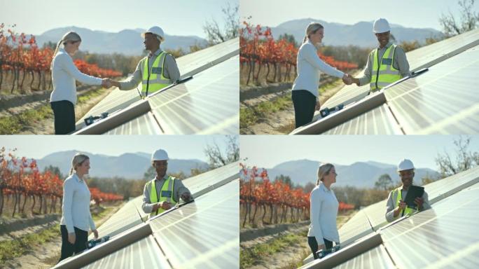工程师，握手和平板聊天，太阳能电池板和可再生能源的维护，太阳能和升级。妇女农民和工程专家握手，欢迎并