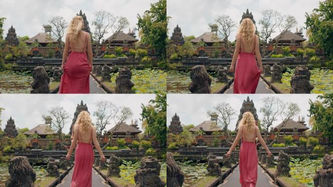 旅游女人探索萨拉斯瓦蒂神庙女游客旅游度假观光美丽的古老文化印度尼西亚巴厘岛4k