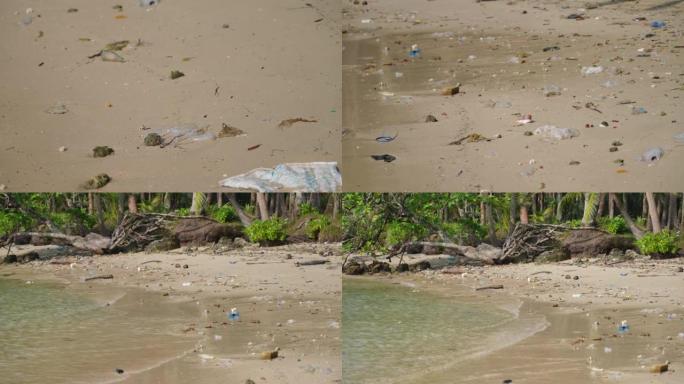 平移缓慢的MO用塑料袋和垃圾冲上海滩