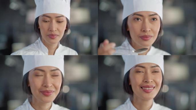 餐厅厨房: 亚洲女厨师准备菜肴，品尝食物并享受美食的肖像。专业烹饪美味、正宗、传统食品，使用健康食材