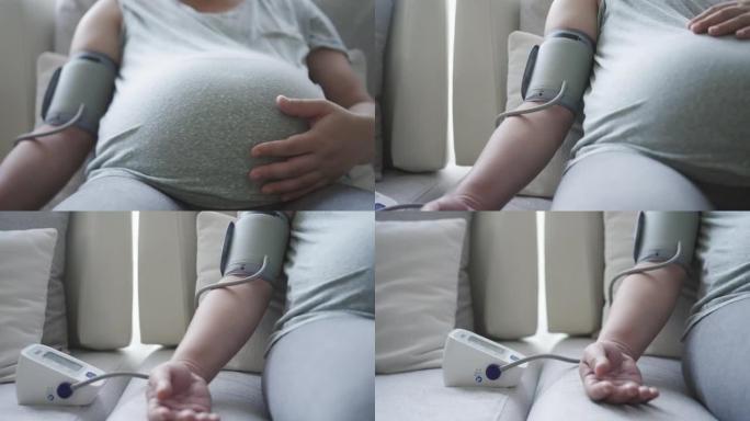 孕妇测量血压孕妇自测抚摸肚子