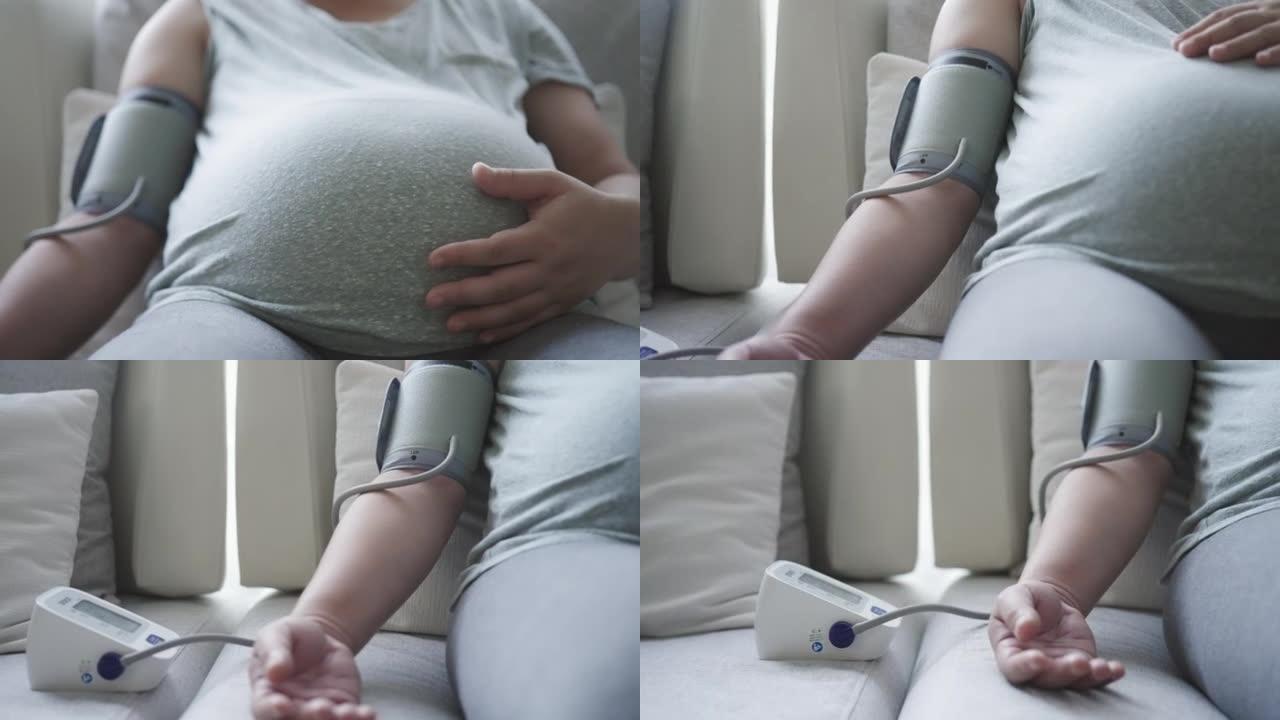 孕妇测量血压孕妇自测抚摸肚子