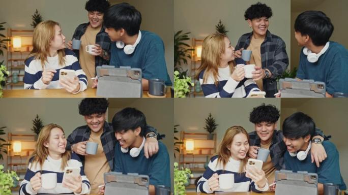 亚洲朋友笑着看着电话。
