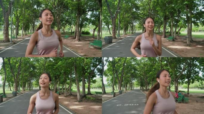 亚洲女子跑步晨跑晨练强健身心蓝牙耳机