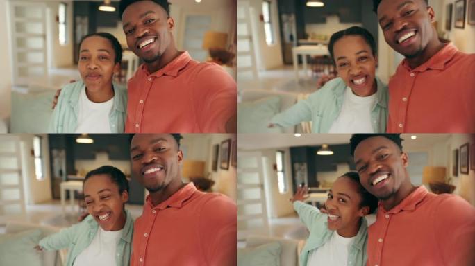 快乐，年轻夫妇在新家视频通话庆祝新房子。影响者、视频记录器的肖像，并在客厅流式传输视频日志。黑人夫妇