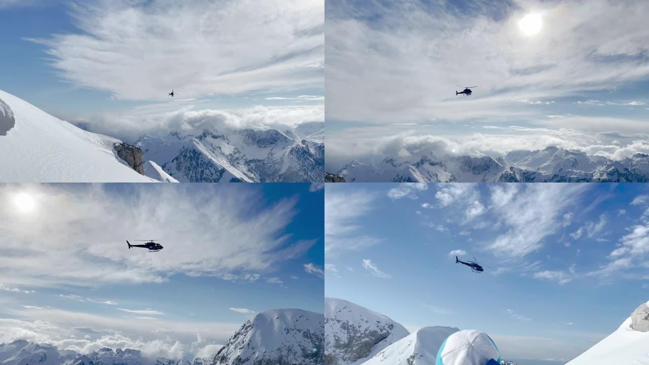 低角度视图: 直升机飞越风景如画的雪山山顶