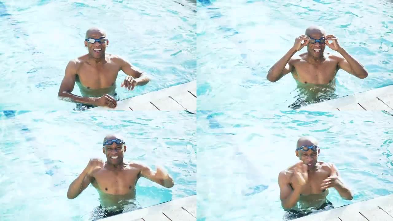 高级非裔美国人在游泳池里游泳圈