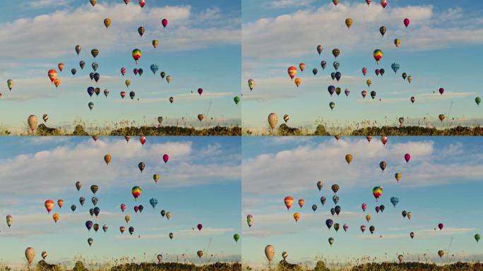 五彩热气球漂浮在晴朗的蓝天