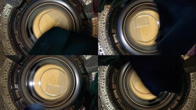 POV: 在金属干燥机滚筒内旋转，同时干燥洗过的内衣。