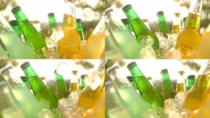 超级SLO MO冰块落在冷却器中的啤酒瓶上