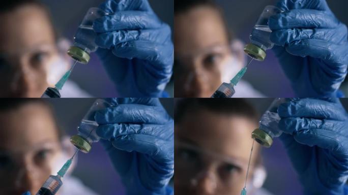 在实验室中使用注射器和小瓶的科学家的4k录像