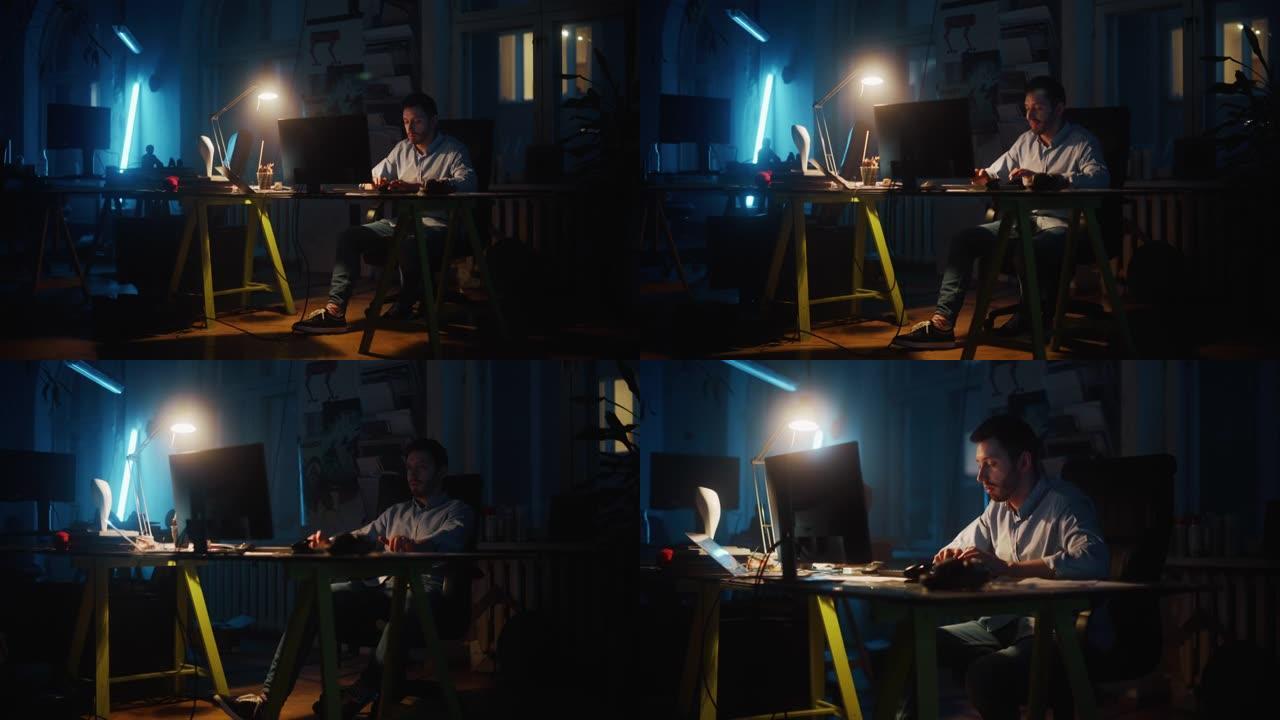 晚上，专注而富有成效的人在Dark Loft办公室的Creative Agency的台式计算机上工作