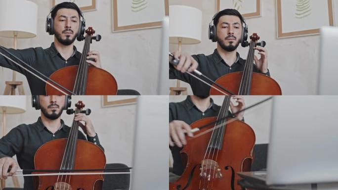 亚洲男子演奏低音提琴