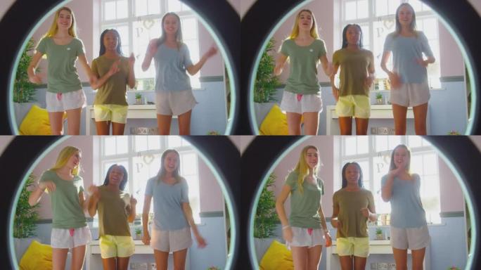 一群多元文化的少女朋友在卧室里闲逛的镜头录制舞蹈套路在社交媒体上发布-慢动作拍摄