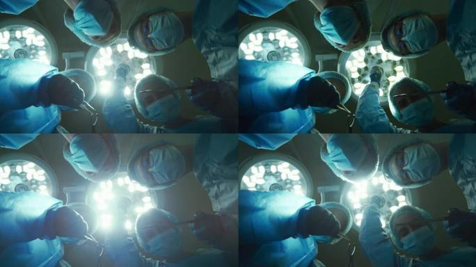 外科医生在手术室戴着口罩拿着手术器械