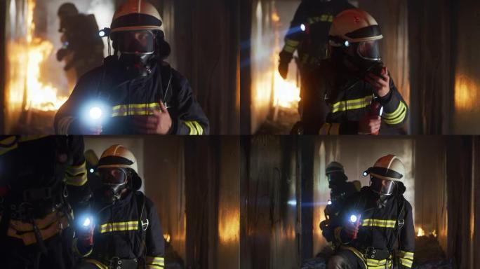消防员一起检查燃烧的走廊