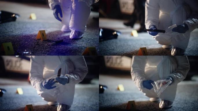 法医专家从犯罪现场挑选一把血淋淋的刀，并将其包装为证据。将凶器放在消毒容器中以保存指纹和痕迹的特写镜