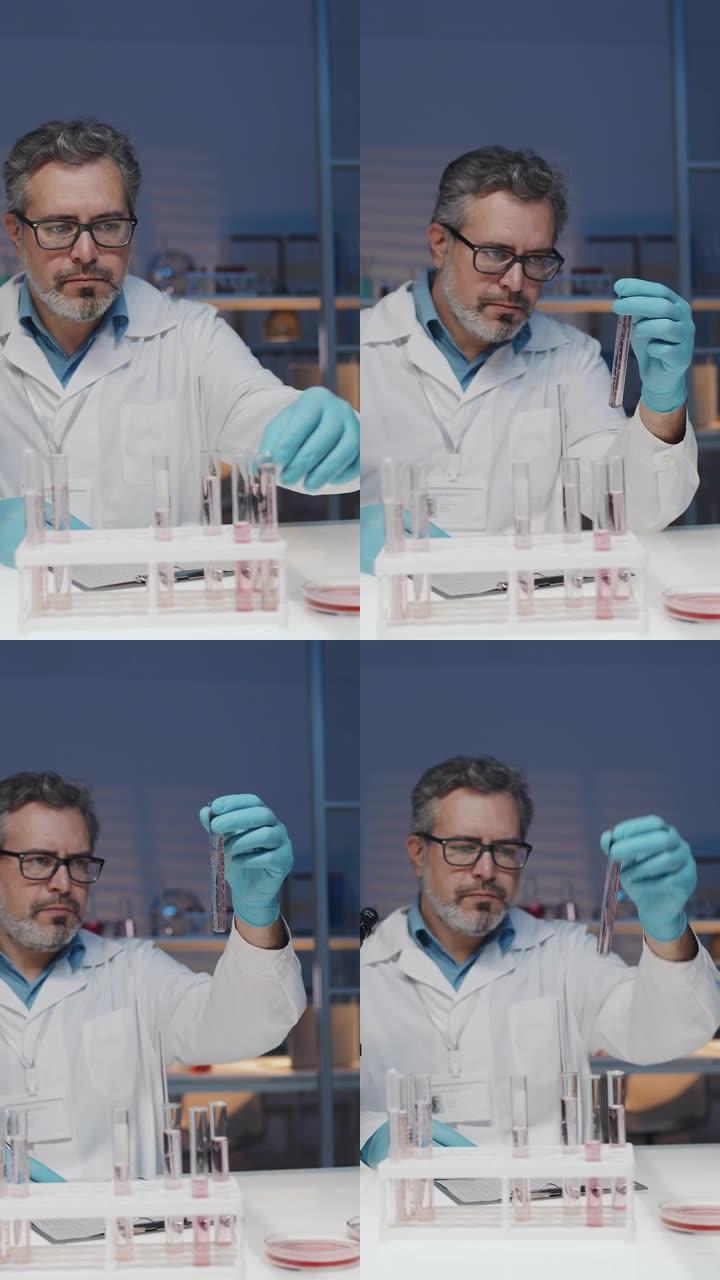 经验丰富的生物技术专家在研究过程中研究烧瓶中的液体