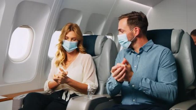 飞机上的手消毒防护口罩出差经济舱